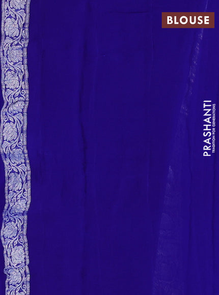 Banarasi chiffon saree royal blue with allover silver zari woven buttas and silver zari woven floral border