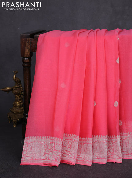 Banarasi chiffon saree peach pink with allover silver zari woven buttas and silver zari woven floral border