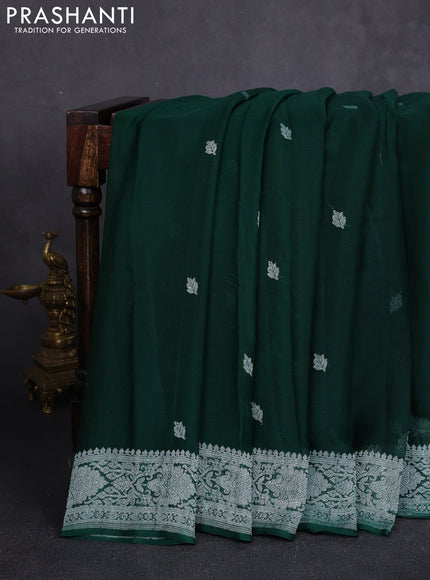 Banarasi chiffon saree bottle green with allover silver zari woven buttas and silver zari woven floral border