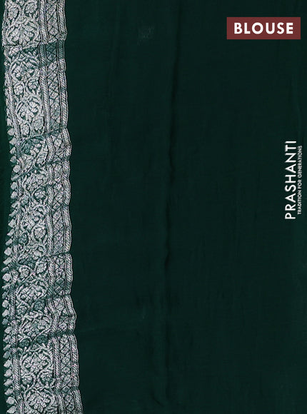 Banarasi chiffon saree bottle green with allover silver zari woven buttas and silver zari woven floral border