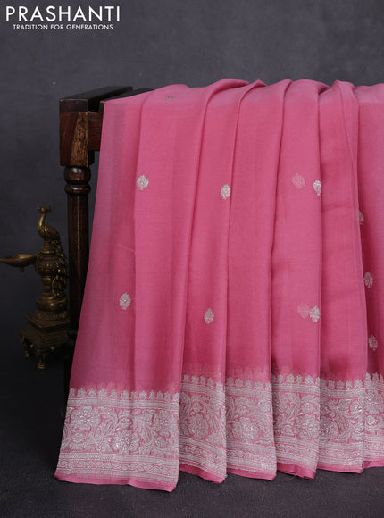 Banarasi chiffon saree peach pink with allover silver zari woven buttas and silver zari woven floral border