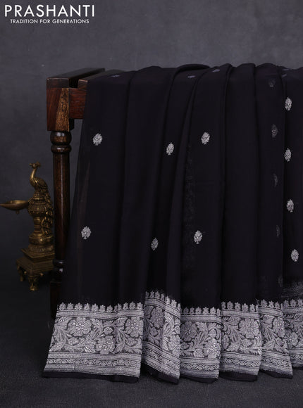 Banarasi chiffon saree black with allover silver zari woven buttas and silver zari woven floral border
