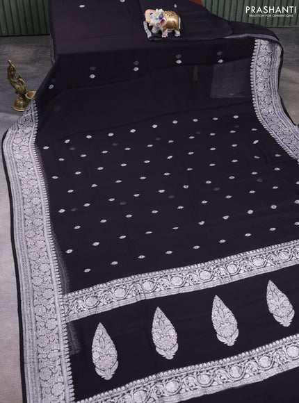Banarasi chiffon saree black with allover silver zari woven buttas and silver zari woven floral border