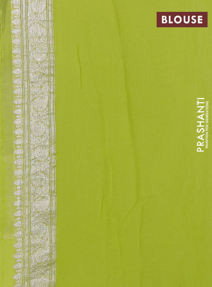 Banarasi chiffon saree lime green with allover silver zari woven buttas and silver zari woven floral border