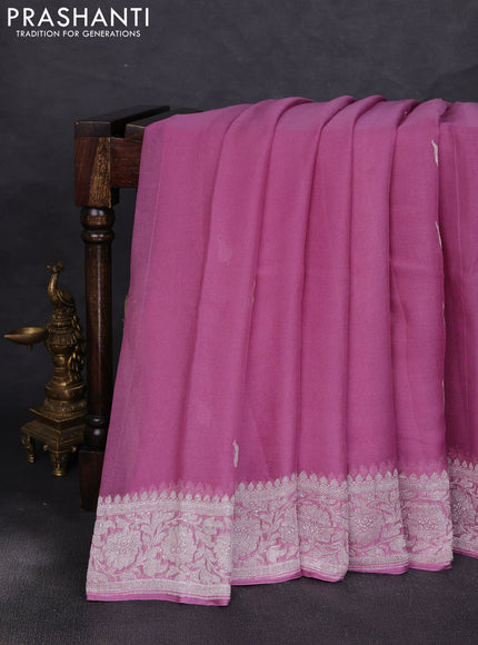 Banarasi chiffon saree mauve pink with allover silver zari woven buttas and silver zari woven floral border