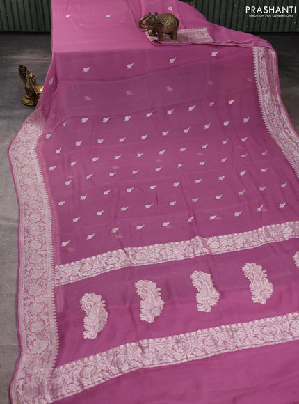 Banarasi chiffon saree mauve pink with allover silver zari woven buttas and silver zari woven floral border