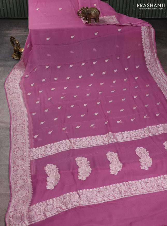 Banarasi chiffon saree mauve pink with allover silver zari woven buttas and silver zari woven floral border