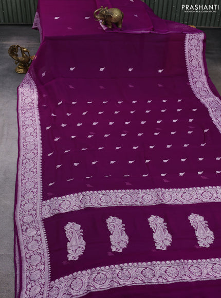 Banarasi chiffon saree purple with allover silver zari woven buttas and silver zari woven floral border