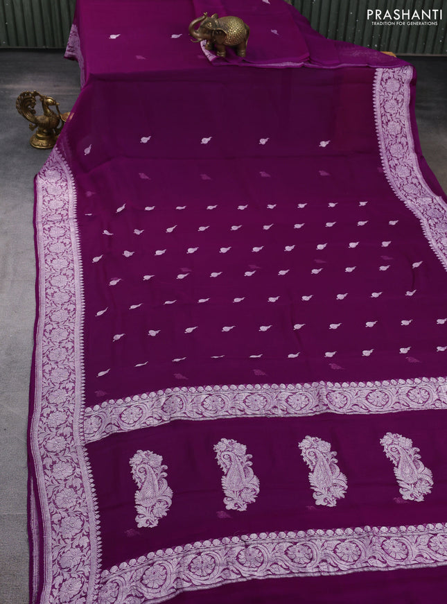 Banarasi chiffon saree purple with allover silver zari woven buttas and silver zari woven floral border
