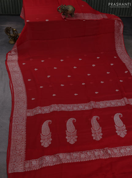 Banarasi chiffon saree red with allover silver zari woven buttas and silver zari woven floral border