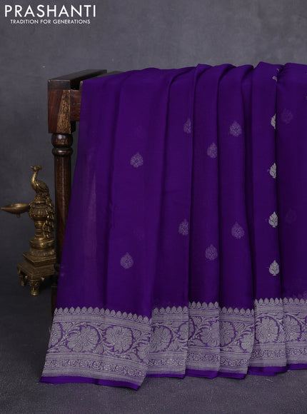Banarasi chiffon saree violet with allover silver zari woven buttas and silver zari woven floral border