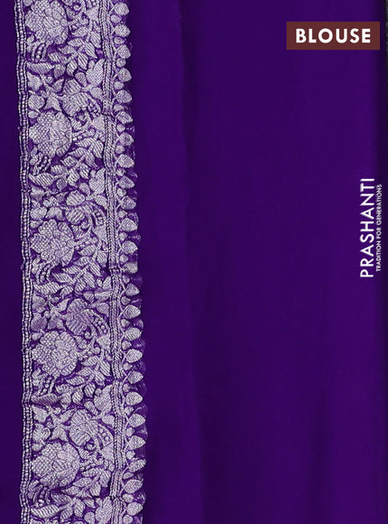 Banarasi chiffon saree violet with allover silver zari woven buttas and silver zari woven floral border