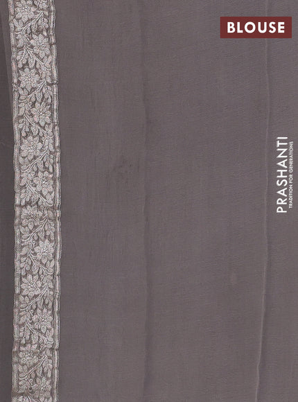 Banarasi chiffon saree grey shade with allover silver zari woven buttas and silver zari woven floral border