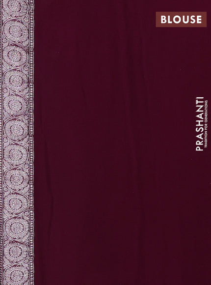 Banarasi chiffon saree purple with allover silver zari woven buttas and silver zari woven floral border
