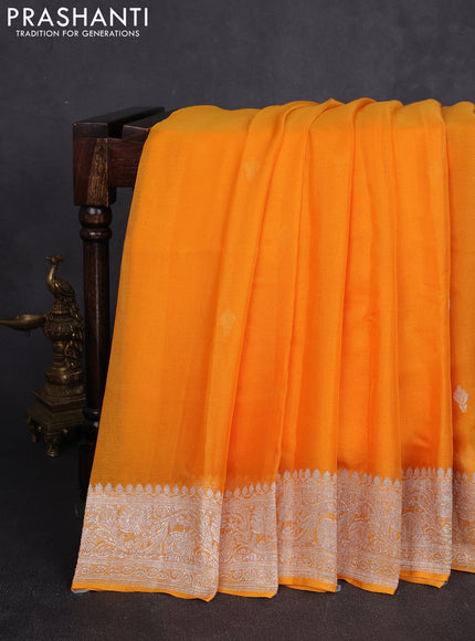 Banarasi chiffon saree mango yellow with allover silver zari woven buttas and silver zari woven floral border