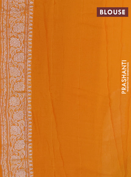 Banarasi chiffon saree mango yellow with allover silver zari woven buttas and silver zari woven floral border