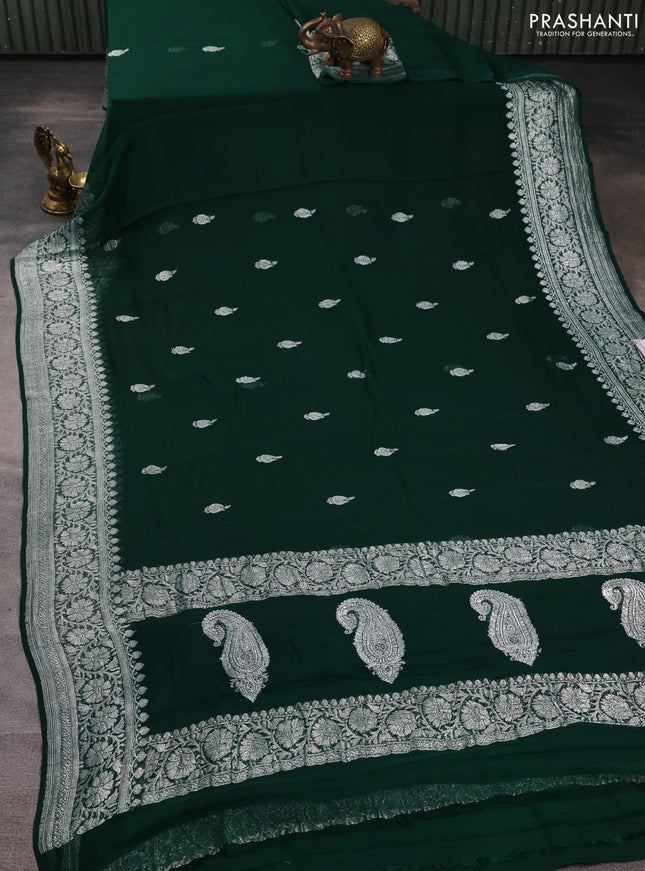 Banarasi chiffon saree bottle green with allover silver zari woven buttas and silver zari woven floral border