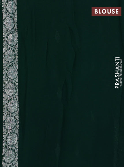 Banarasi chiffon saree bottle green with allover silver zari woven buttas and silver zari woven floral border