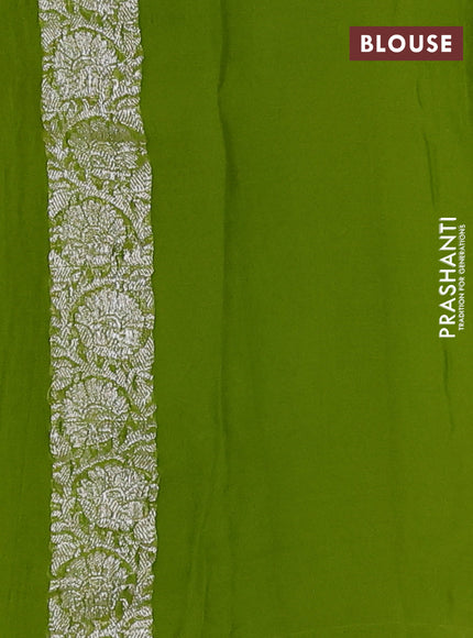 Banarasi chiffon saree lime green with allover silver zari woven buttas and silver zari woven floral border