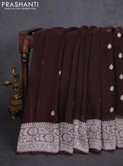 Banarasi chiffon saree coffee brown with allover silver zari woven buttas and silver zari woven floral border