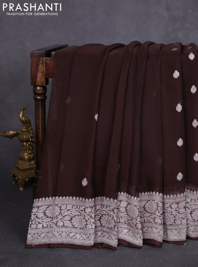 Banarasi chiffon saree coffee brown with allover silver zari woven buttas and silver zari woven floral border