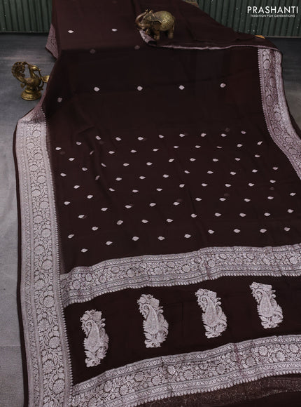 Banarasi chiffon saree coffee brown with allover silver zari woven buttas and silver zari woven floral border