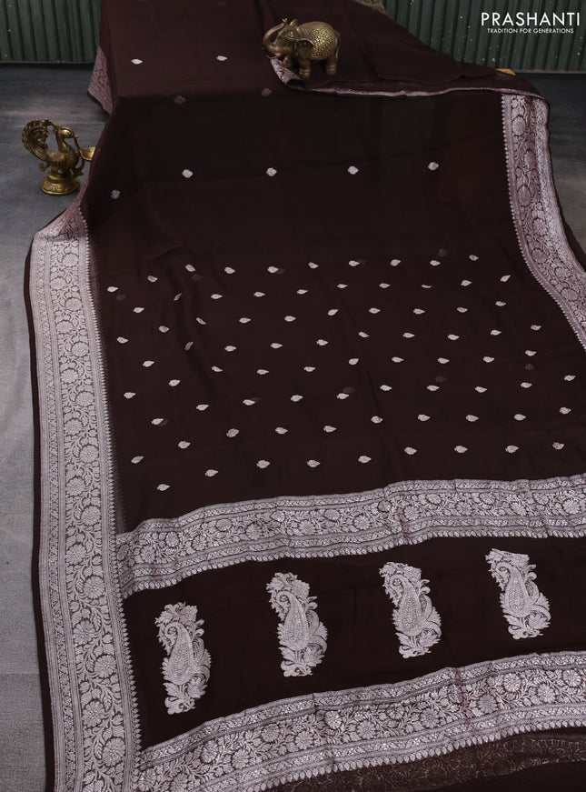Banarasi chiffon saree coffee brown with allover silver zari woven buttas and silver zari woven floral border
