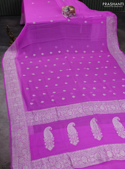 Banarasi chiffon saree mild lavender shade with allover silver zari woven buttas and silver zari woven floral border