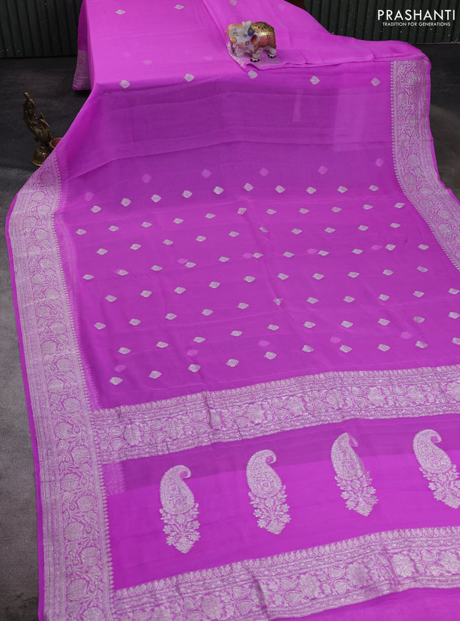 Banarasi chiffon saree mild lavender shade with allover silver zari woven buttas and silver zari woven floral border