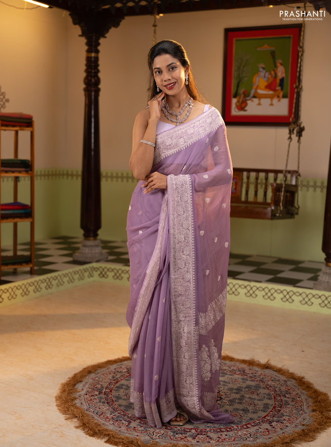 Banarasi chiffon saree lavender with allover silver zari woven buttas and silver zari woven floral border
