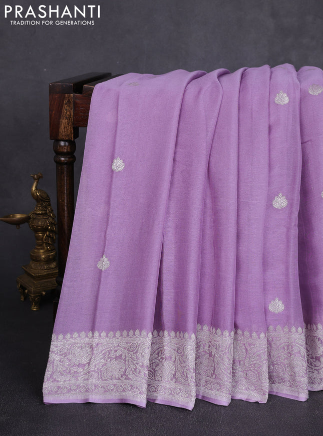 Banarasi chiffon saree lavender with allover silver zari woven buttas and silver zari woven floral border