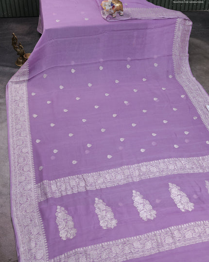 Banarasi chiffon saree lavender with allover silver zari woven buttas and silver zari woven floral border