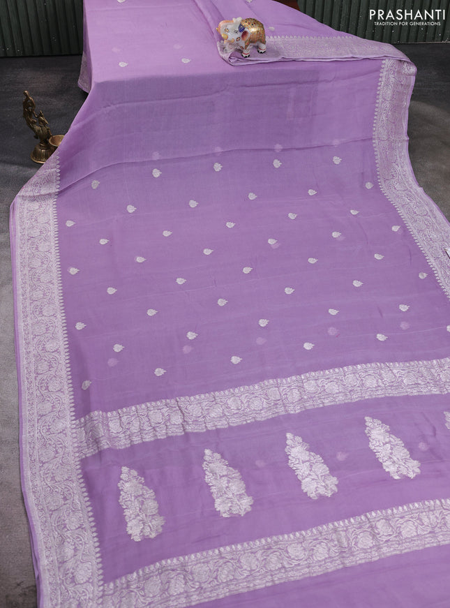 Banarasi chiffon saree lavender with allover silver zari woven buttas and silver zari woven floral border