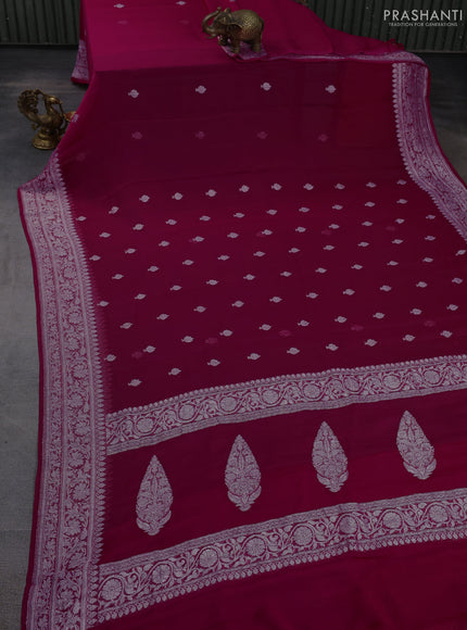 Banarasi chiffon saree dark pink with allover silver zari woven buttas and silver zari woven floral border