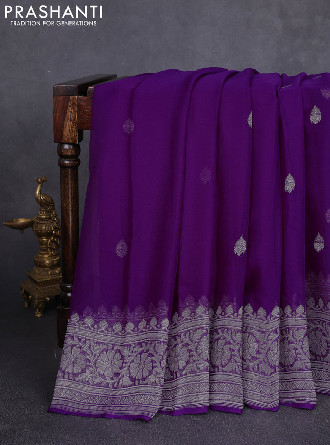 Banarasi chiffon saree purple with allover silver zari woven buttas and silver zari woven floral border