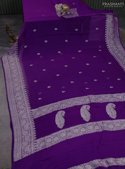 Banarasi chiffon saree purple with allover silver zari woven buttas and silver zari woven floral border