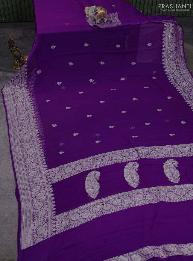 Banarasi chiffon saree purple with allover silver zari woven buttas and silver zari woven floral border