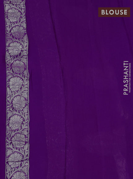 Banarasi chiffon saree purple with allover silver zari woven buttas and silver zari woven floral border