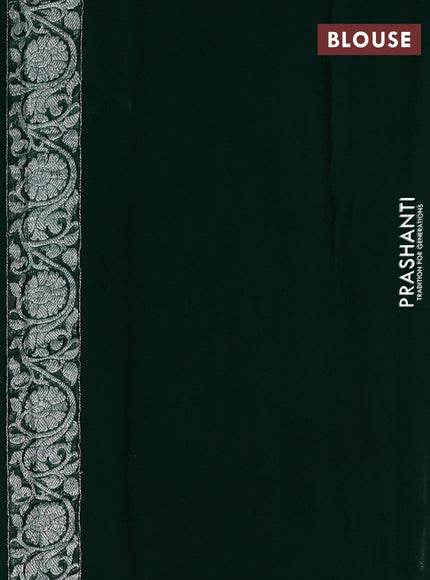 Banarasi chiffon saree bottle green with allover silver zari woven buttas and silver zari woven floral border