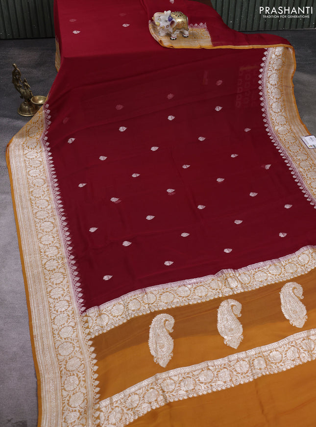 Banarasi chiffon saree red and orange with allover silver zari woven buttas and silver zari woven floral border