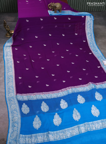 Banarasi chiffon saree purple and cs blue with allover silver zari woven buttas and silver zari woven floral border
