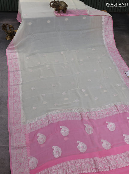 Banarasi chiffon saree off white and light pink with allover silver zari woven buttas and silver zari woven floral border
