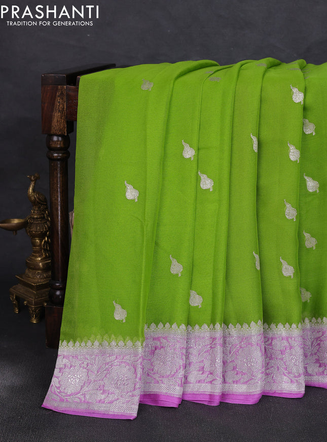 Banarasi chiffon saree light green and lavender with allover silver zari woven buttas and silver zari woven floral border