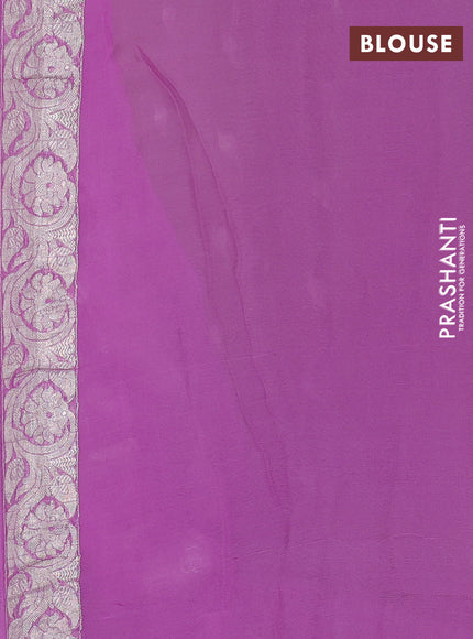 Banarasi chiffon saree light green and lavender with allover silver zari woven buttas and silver zari woven floral border