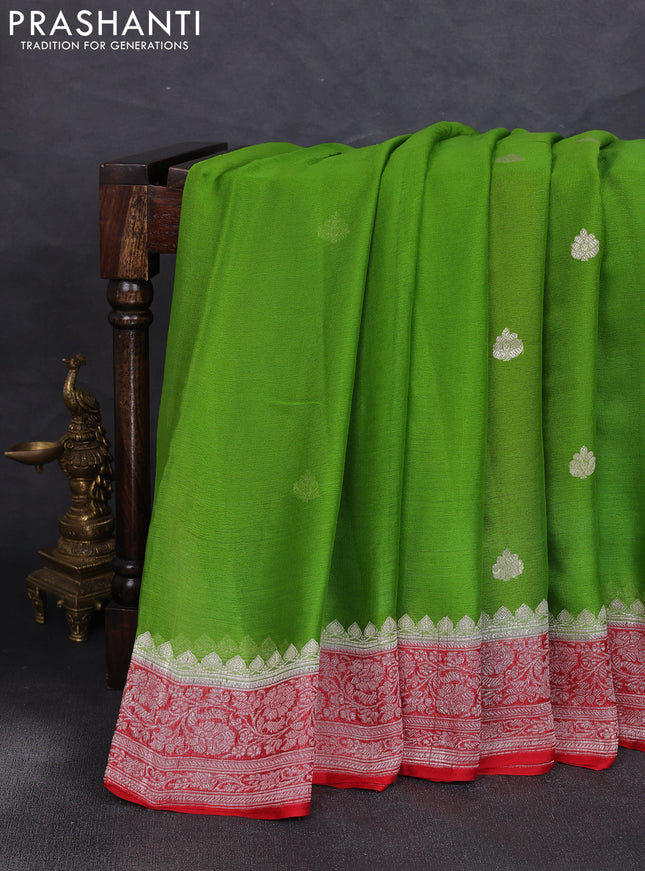 Banarasi chiffon saree green shade and red with allover silver zari woven buttas and silver zari woven floral border