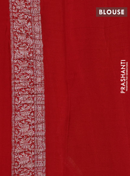 Banarasi chiffon saree green shade and red with allover silver zari woven buttas and silver zari woven floral border