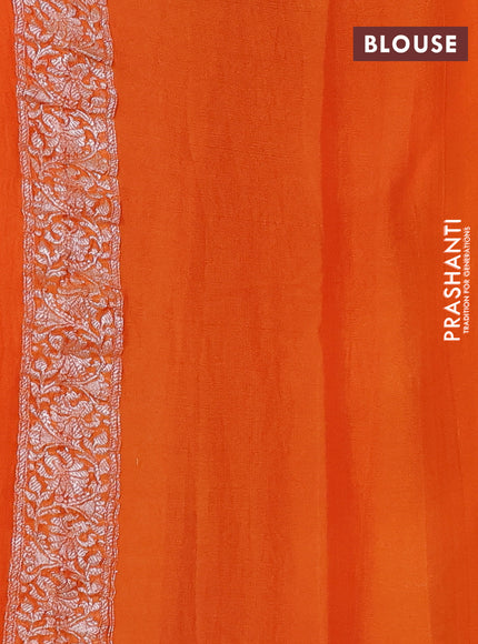 Banarasi chiffon saree red and orange with allover silver zari woven buttas and silver zari woven floral border
