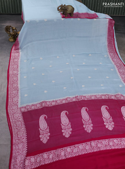 Banarasi chiffon saree pastel blue and pink with allover silver zari woven buttas and silver zari woven floral border