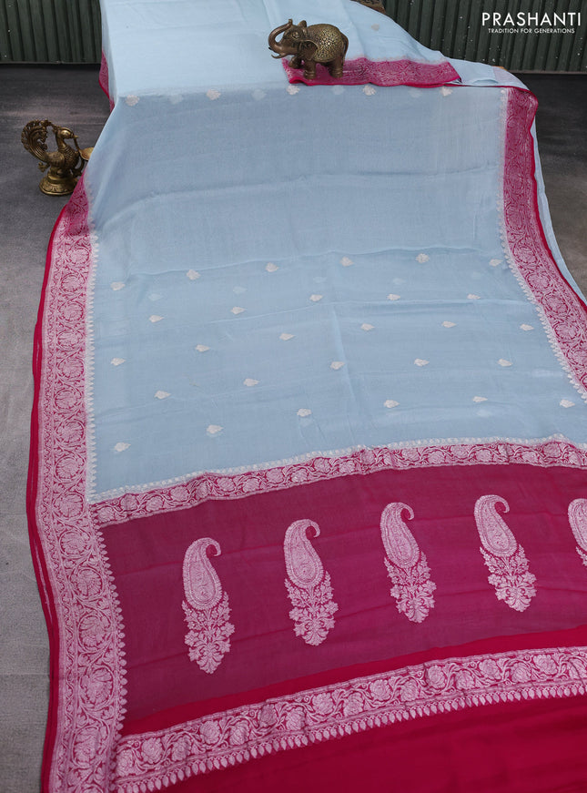 Banarasi chiffon saree pastel blue and pink with allover silver zari woven buttas and silver zari woven floral border