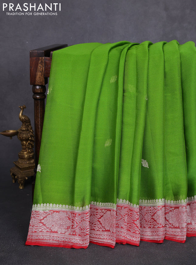 Banarasi chiffon saree green and red with allover silver zari woven buttas and silver zari woven floral border
